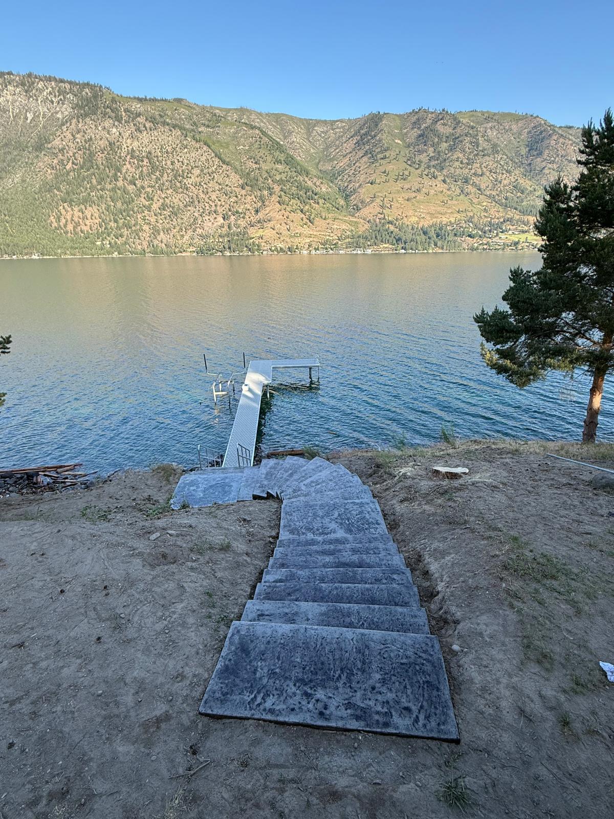 Concrete stairs descending toward Lake Chelan