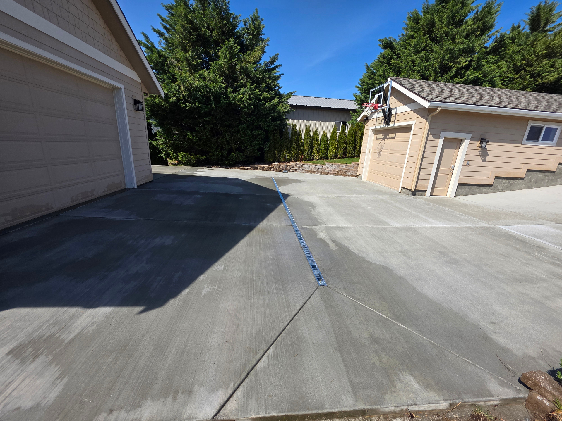 Wide concrete driveway project completed by RACD Concrete